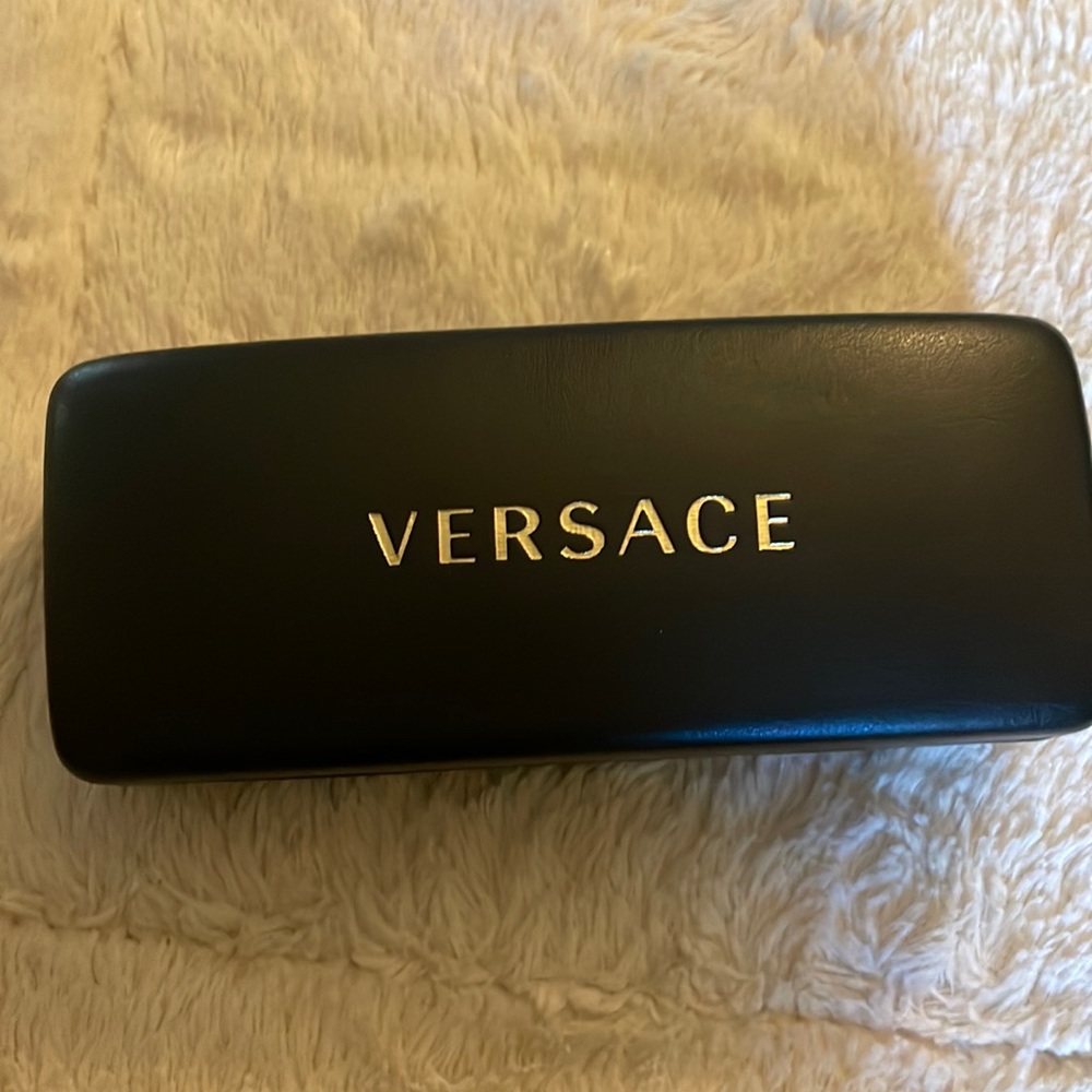 Burgundy and gold studded Versace sunglasses
